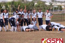 The Cougar coaching staff does their mandatory push ups after the team grabbed the win. (photo by Robert Balajadia)