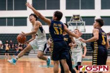 Harvest Eagle Ryo Eda finds his shot against Guam High Panther Damien Dela Cruz. (Photo by Michael Blas)