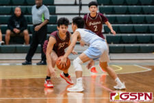 St. Paul Warrior Hayato Tsujii dribbles as FD Friar Matthew Santos looks for a steal. (Photo by Michael Blas)