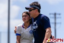ND Royal Gia Camacho and father celebrate after winning the championship in double overtime. (Photo by Michael Blas)