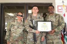 The California Army National Guard’s Staff Sgt. Joey J. Gogue, center, receives an Army Achievement Medal after earning the Top Noncommissioned Officer title during the 49th Military Police Brigade 2020 Best Warrior Competition (BWC) Aug. 8-12, 2020, at Camp Roberts, California. Gogue, who has Chamorro heritage, is awarded by Col. Marlena A. Decelle, 49th commander, and Command Sgt. Maj. Andraus L. Williams, 49th command sergeant major. Gogue represented Forward Support Company, 579th Engineer Battalion. He is the 49th’s representation in November’s state-level BWC. If he wins again, Gogue will represent California in National Guard Bureau’s Regional BWC, where he will compete against top NCOs from Hawaii, Nevada, Colorado, Arizona, New Mexico, Utah and Guam. Guam was to host this year’s Regional BWC, but the coronavirus pandemic halted the May event. (U.S. Army National Guard photo by Staff Sgt. Eddie Siguenza)