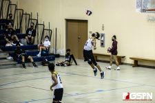 Tiyan High Titans VJ Rosario goes airborne for the serve. Photo by Bout It Productions