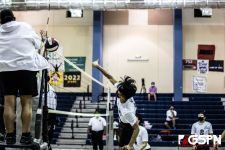 Okkodo Bulldogs D. David powers the ball to the defender. Photo by Bout It Productions