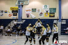 The Tiyan High Titans celebrate after leading by two sets over the Okkodo Bulldogs. Photo by Bout It Productions