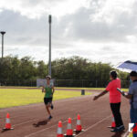 The Southern High Dolphins head north to The JFK Islanders turf for the ISA Cross Country Meet. Photo by Bout It Productions