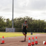 The Southern High Dolphins head north to The JFK Islanders turf for the ISA Cross Country Meet. Photo by Bout It Productions