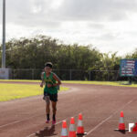 The Southern High Dolphins head north to The JFK Islanders turf for the ISA Cross Country Meet. Photo by Bout It Productions