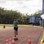 The Southern High Dolphins head north to The JFK Islanders turf for the ISA Cross Country Meet. Photo by Bout It Productions