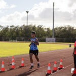 The Southern High Dolphins head north to The JFK Islanders turf for the ISA Cross Country Meet. Photo by Bout It Productions