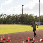 The Southern High Dolphins head north to The JFK Islanders turf for the ISA Cross Country Meet. Photo by Bout It Productions