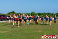 Runners leave the starting line to kick off the IIAAG Cross Country All-Island. (Photo by Michael Blas)