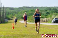Guam High Panther Liliana Fennessey leads the way midway through the race. (Photo by Michael Blas)