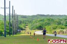 Guam High Panther Hailey Burns makes it up the steady incline at the midway mark. (Photo by Michael Blas)