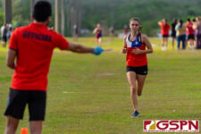 A St. John's Knight runner makes her way to the finish line of the IIAAG Cross Country All-Island meet. (Photo by Michael Blas)