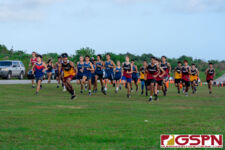 Runners take off from starting line of the IIAAG Cross Country All-Island meet. (Photo by Michael Blas)