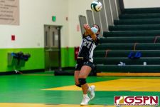 Sanchez Shark Janelle Almoite makes a nice receive in the closing of the third set. (Photo by Michael Blas)