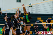 Sanchez Shark Heather Reyes fights off JFK Islander Kamalynne Lizama to score. (Photo by Michael Blas)