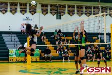 Sanchez Shark Sadie Tumanda leaps up for a spike in the third set. (Photo by Michael Blas)