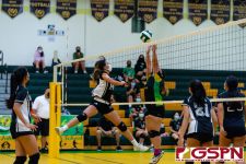 Sanchez Shark Heather Reyes flies in to send the ball over. (Photo by Michael Blas)