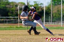 GW Gecko Savannah Grant tags out Academy Cougar Savanna Aguon. (Photo by Michael Blas)