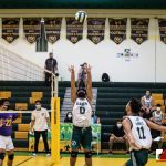 JFK Islander Jaron Ceria sets the ball up for his teammate. Photo by Bout It Productions