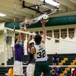 JFK Islander Irvin White meets face to face with two GW Geckos. Photo by Bout It Productions