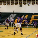 GW Gecko Carlos Montejo sends the ball back to the JFK Islanders. Photo by Bout It Productions