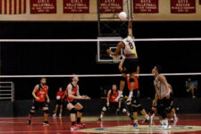 The FD Friars finished the season unbeaten, winning their final game over the home team St. John's Knights in four sets. (photo by Omar Nobuo)