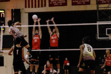 The FD Friars finished the season unbeaten, winning their final game over the home team St. John's Knights in four sets. (photo by Omar Nobuo)