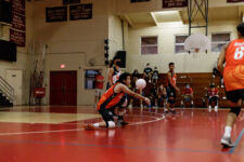The FD Friars finished the season unbeaten, winning their final game over the home team St. John's Knights in four sets. (photo by Omar Nobuo)