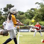 Team Rails Teran Topasna swings at bat in the 3rd Annual APL Womens Fast Pitch League held at the Piti Baseball Field. ( Photo by Bout It Productions )