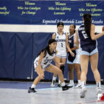 Academy Cougar Oriana Sevilla looks to defend against St. Paul Warrior Jan Quintanilla. ( photo by Bout It Productions )