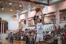 Friar Brock Ada goes up after collecting the offensive board for second chance points. (photo by Raine Delos Reyes)