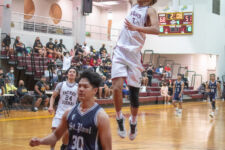 Friars Center Daryl Robles flies to the rim for a break away dunk in the 4th quarter. (photo by Raine Delos Reyes)