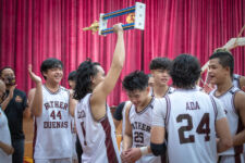 The Friars hoist up the ISA Basketball 1st Place trophy after defeating the St. Paul Warriors. (photo by Raine Delos Reyes)