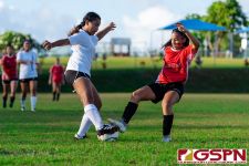 ND Royal Anita Manglona defends against St. John's Knight Olivia Haddock. (Photo by Michael Blas)