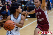 St. Paul Warrior Jon Sevilla goes head to head against FD Friar Jeremiah David. (Photo by Michael Blas)