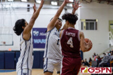 St. Paul Warriors Jon Sevilla and Josiah Quintanilla double team FD Friar Kaine Santos. (Photo by Michael Blas)