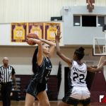 Team Supreme Janniliese Quintanilla looks to pass while Team Elite Amaiya Fontanilla defends. (photo by Bout It Productions)