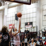 Team Elite Mia Taitano goes up for the shot against Team Supreme Amanda Uncangco. (photo by Bout It Productions)