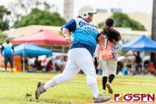 Southern Fran Blas runs through first base off a big hit outfield. (Photo by Michael Blas)