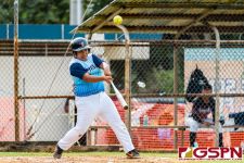 Southern Mish Fejeran makes contact with the ball at bat. (Photo by Michael Blas)