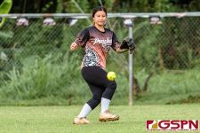 Peaches Kiana Palomo tracks the ball in the outfield. (Photo by Michael Blas)