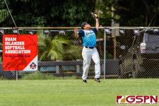 Southern Merced Flores leaps up to make the catch in the outfield. (Photo by Michael Blas)