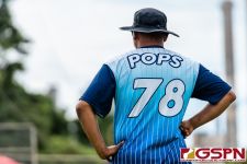 Southern's Coach Pops guides his team during the game. (Photo by Michael Blas)