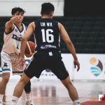 Team Guam's Tomas Calvo direct traffic in mid court . (photo by Bout It Productions)
