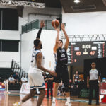 Team Chinese Taipei's Te-Wei Lee attempt a shot over Team Guam's Jonathan Galloway. (photo by Bout It Productions)