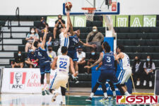 Guam's Christopher Conner and Taipei's Ying-Chun Chen go head to head in the paint. (Photo by Michael Blas)
