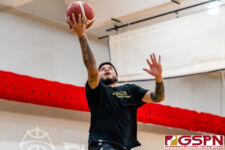 The Bank of Guam Men's Basketball Team run through drills at practice for their game against Chinese Taipei. (Photo by Michael Blas)