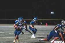 Guam High Panther Deshawn Baird gains yardage against the Southern High Dolphins. (photo by Bout It Productions)